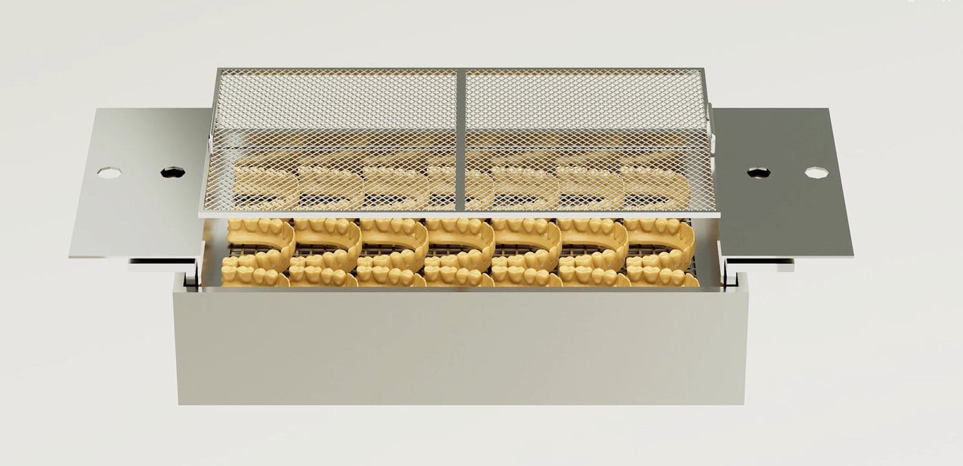 Collection basket with safety mesh cover holding printed dental models